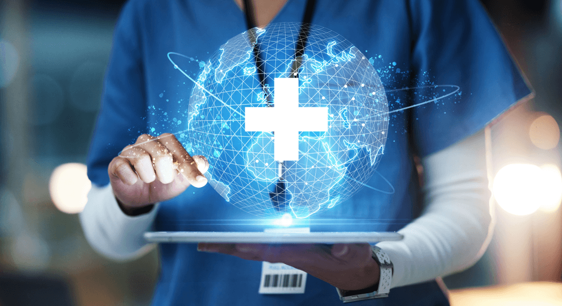 Healthcare professional holding tablet with illustration of a white cross